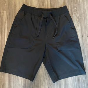 Lululemon Men’s shorts, size M, 9” inseam, stretchy, black color.